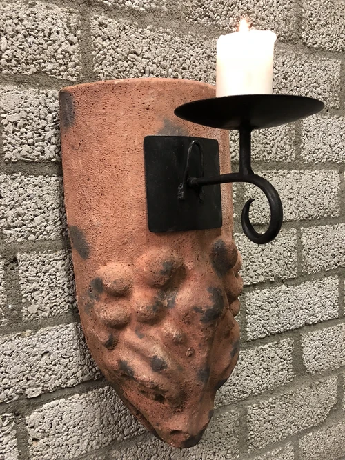 Wind light from roof tile with mythical image, with candlestick.