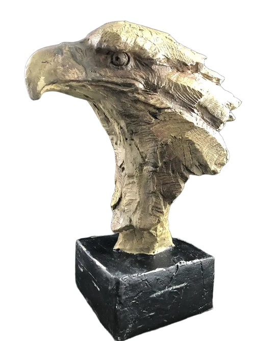 A beautiful head of an eagle, beautiful in detail, polystone wood look
