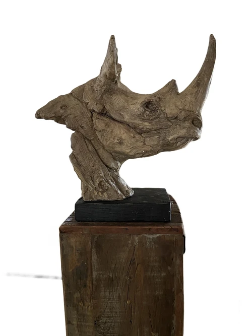 A beautiful head of a rhino, beautiful in detail, polystone wood look