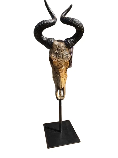 Beautiful carved skull on metal stand, beautiful design!