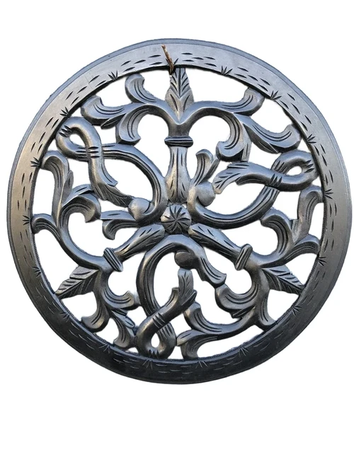 Wall ornament round, beautifully carved, black-brown, small