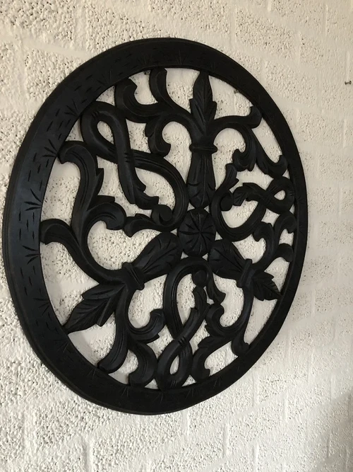 Wall ornament round, decoratively carved, black-brown, beautiful!