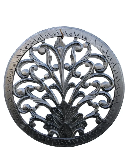 Wall ornament round, decoratively carved, black-brown, small