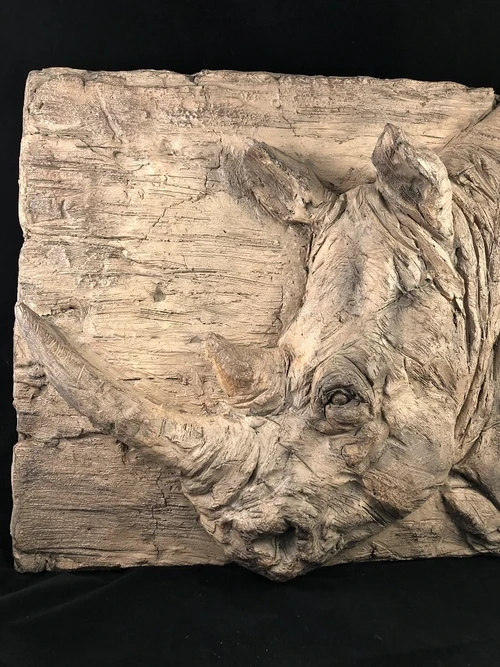 Wall ornament wood look with 3D image of a rhino, polystone-wood.