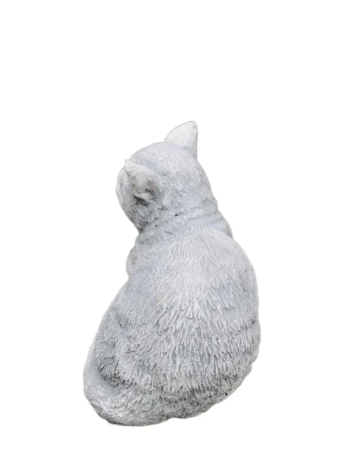 A beautiful lying cat, made of stone, beautiful in detail