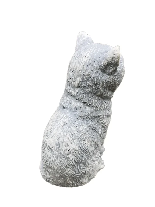 A beautiful sitting cat, made of stone, beautiful in detail