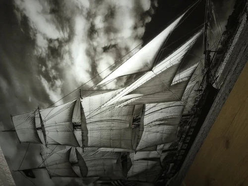 Art on glass showing a beautiful sailing ship