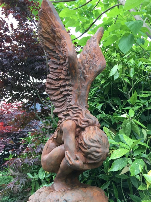 Very large kneeling oxide Angel with wings up on a large oxide pedestal, very large and unique!
