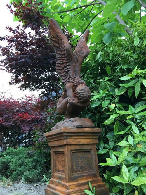 Very large kneeling oxide Angel with wings up on a large oxide pedestal, very large and unique!