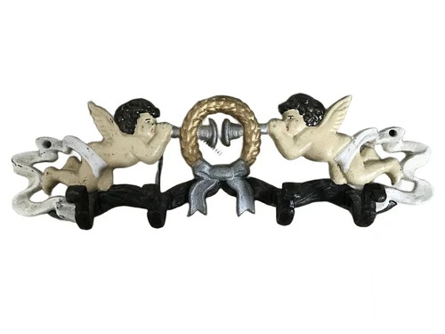Coat rack with angel, in cast iron and in color
