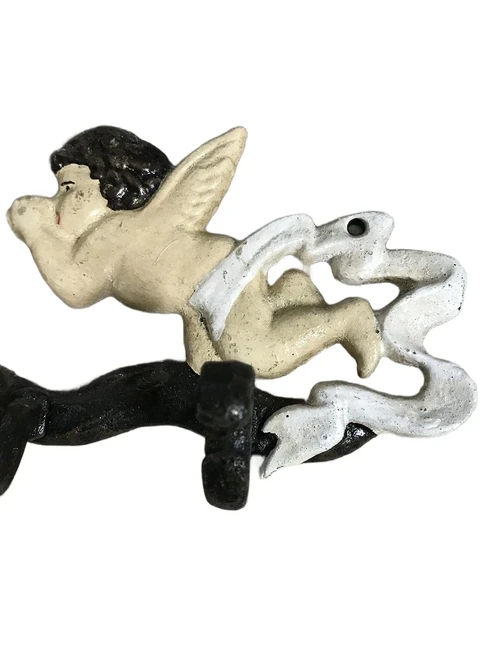 Coat rack with angel, in cast iron and in color