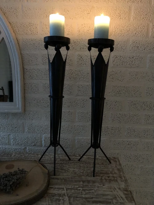 Set of beautiful standing metal castle torches with crown