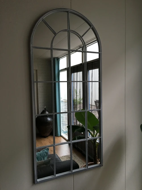 Large hefty mirror with metal frame, very nice in shape.
