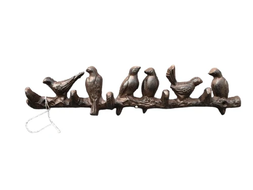 Beautiful branch with birds, cast iron with 5 coat hooks.