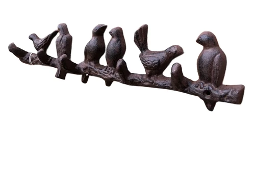 Beautiful branch with birds, cast iron with 5 coat hooks.