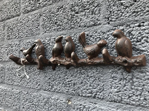 Beautiful branch with birds, cast iron with 5 coat hooks.