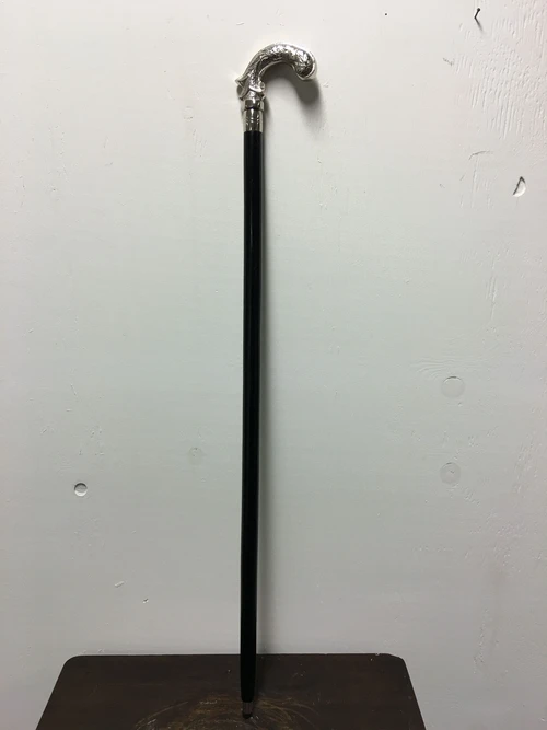Wandelstok met prachtig versierd nikkelen greep