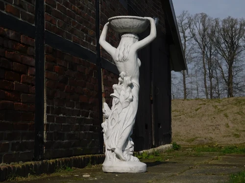 Large sculpture of a woman with bowl - made entirely of stone - 120 cm