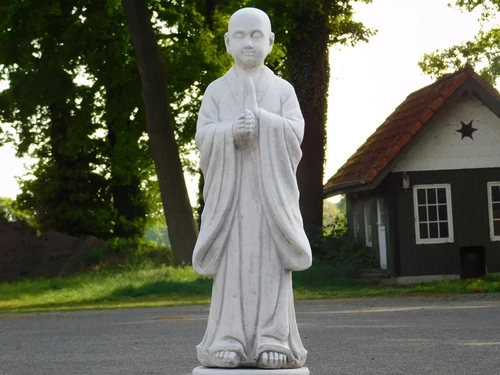 Greeting Monk on Pedestal - Solid Stone