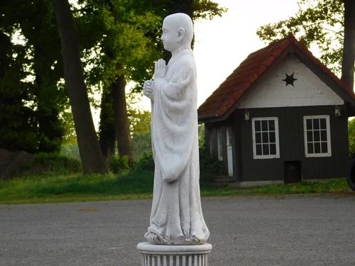 Greeting Monk on Pedestal - Solid Stone