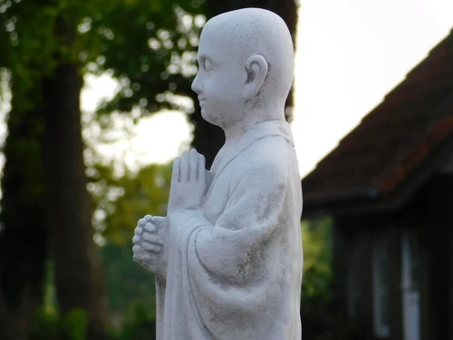 Greeting Monk on Pedestal - Solid Stone