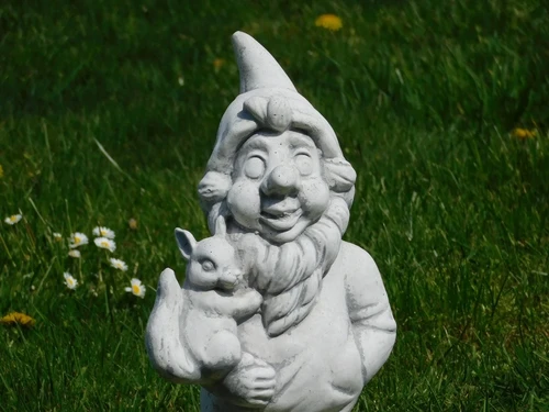 Statue gnome with squirrel - solid stone