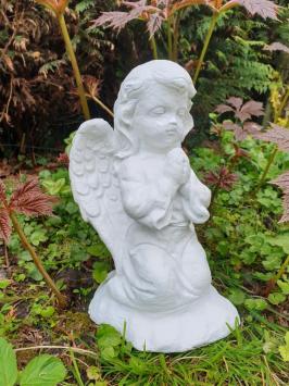 Praying angel, garden statue