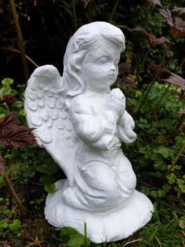 Praying angel, garden statue