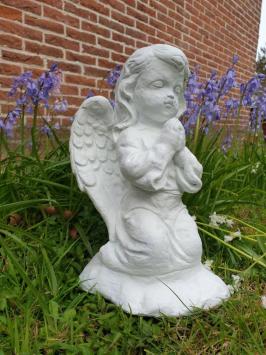 Praying angel, garden statue