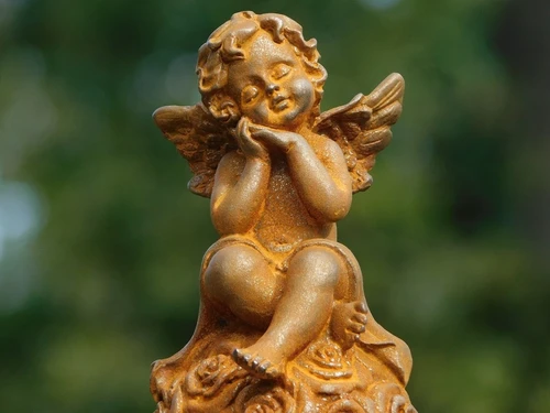 Engel op Bol van Rozen – Gietijzer – ca. 15,5 cm hoog